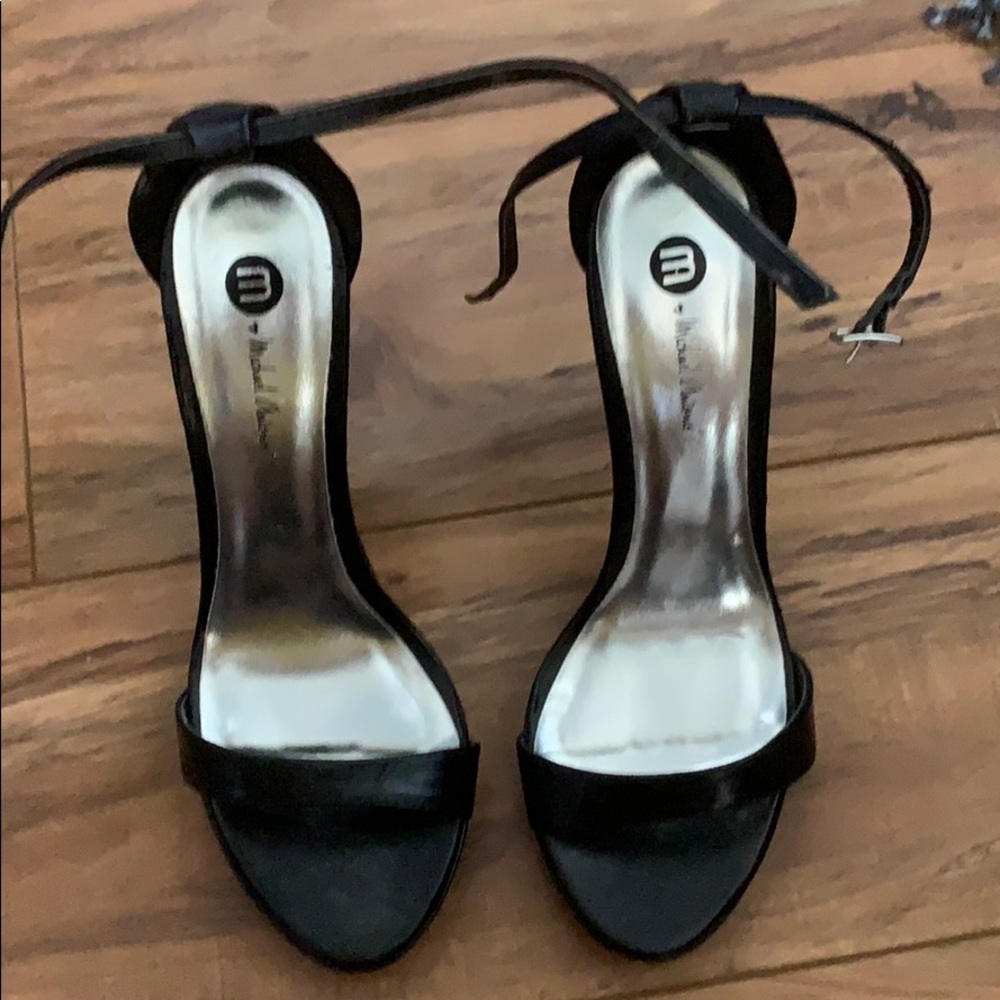 Black heels by Michael Antonio